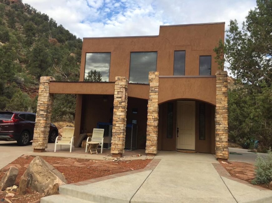 House with Stone Masonry Pillars