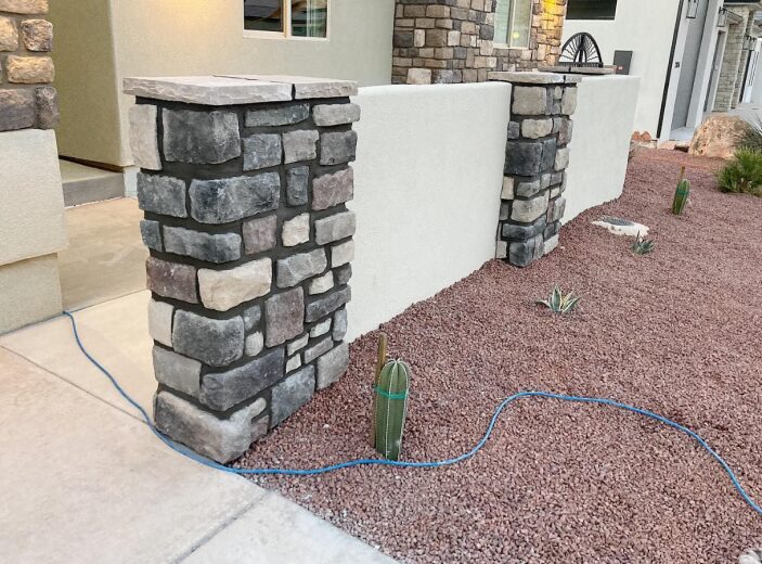 an outdoor wall with masonry work