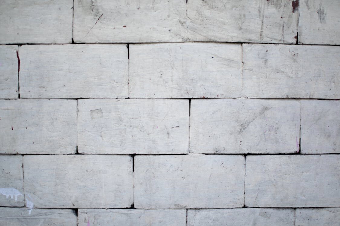 A close-up of a solid block wall.