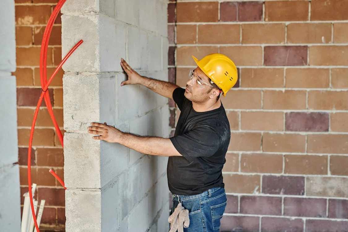  A masonry team performing routine inspections