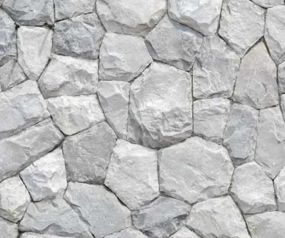 A close-up of a stone facade.