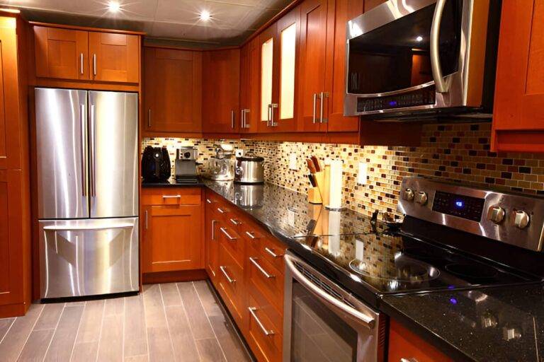 Modern tiled kitchen backsplash and bathroom floor in a Toronto home